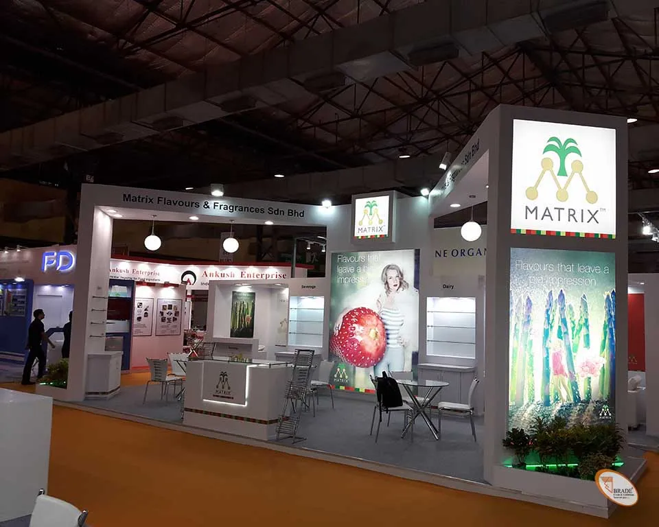 Exhibition stand with integrated digital displays and branding elements